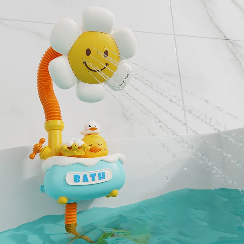 Ducha de juego para bebé con pato y flor dentro de la bañera